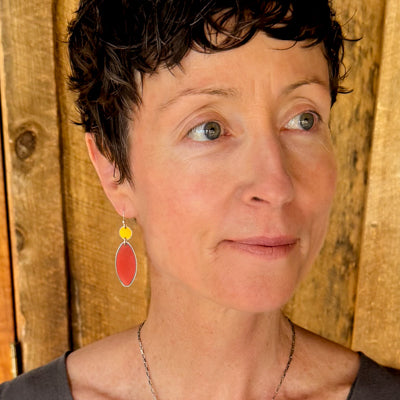 Addie - Ford earrings featuring 72 Ford pickup yellow and 69 Ford Maverick red with sterling silver ear wires on model.