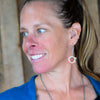 Woman wearing Thelma - Ford pickup earrings made from original 74 Ford F150 paint with sterling silver ear wires