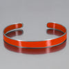 Alberta -  orange Ford pickup bracelet made from 74 Ford F150 with original car paint, intact. Handmade jewelry by Joyride Jewelry.