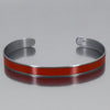 The Otto - Mercury Monterey cuff bracelet features a sleek, glossy red enamel  paint. Made from vintage cars with the original car paint intact. Handmade jewelry by Joyride Jewelry.