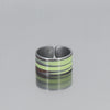 The Delmar - Plymouth Satellite, is a green band style adjustable ring made using vintage car parts with the original car paint intact.