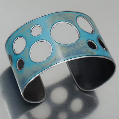 Elwood - Chevy El Camino bracelet featuring original 60 Chevy El Camino car paint with circular cutout design.
