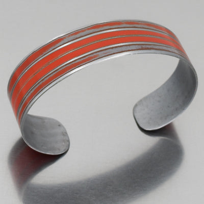 Alfonso - Mercury Monterey bracelet made from 69 Mercury Monterey with original paint, adjustable size, silver and orange design.