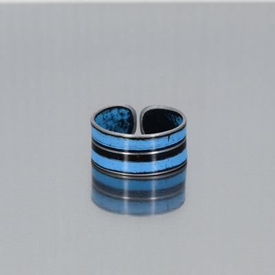 Samson adjustable baby blue ring with a black stripe made from a 72 Chevy pickup with the original car paint intact. Handmade by Joyride Jewelry. 