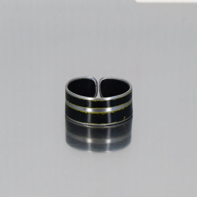 Sonnie ring made from a black 68 GMC pickup with the original car paint intact. Adjustable. Jewelry made from vintage cars. Joyride Jewelry.