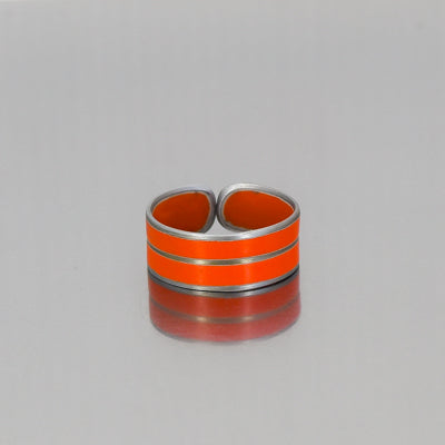 Samson ring, adjustable, orange with an etched strip made from a 74 Ford F150 pickup with the original car paint intact. 