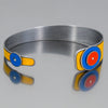 Billie - Ford & AMC bracelet with original 72 Ford pickup yellow paint and blue and orange accents on metal band.
