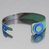 Billie - Dodge & Ford bracelet made from 75 Dodge forest service truck paint with blue accents adjustable wrist size.