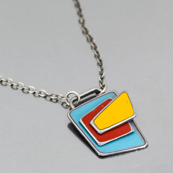 Claudia - Ford necklace with original car paint from ’64 Thunderbird, ’61 Falcon, ’72 pickup on sterling silver chain.