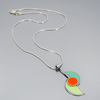 Beverly - Plymouth, Ford, Dodge pendant necklace with original car paint and sterling silver chain on gray background.