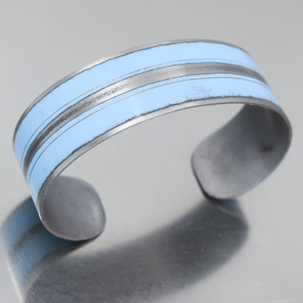 Irving - Oldsmobile bracelet with original car paint, blue and silver stripes, adjustable metal cuff design.
