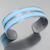 Irving - Oldsmobile bracelet with original car paint, blue and silver stripes, adjustable metal cuff design.