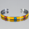 Emril - Ford, Mercury, Mazda bracelet with yellow, red, and blue original car paint accents on silver band.