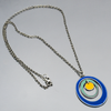 Earnestine - Ford & Dodge pendant necklace with oxidized sterling silver chain and colorful concentric circles design.
