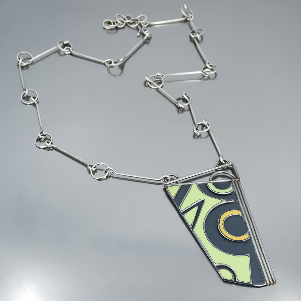 green and grey necklace handmade using vintage car parts with the original car paint intact. Joyride Jewelry. Jewelry made from vintage car parts. 
Fun, unique, original, colorful
sustainable, recycled 
mid century modern, retro vibe, 
Big, Bold, striking, statement, one of a kind necklace. oxidized sterling silver chain.