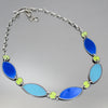 turquoise and green necklace handmade using vintage car parts with the original car paint intact. Joyride Jewelry. Jewelry made from vintage car parts. Plymouth Satellite, turquoise 64 Ford Thunderbird.
Fun, unique, original, colorful
sustainable, recycled, retro vibe, Big, Bold, striking, statement, colorful, one of a kind, oxidized sterling silver chain. 