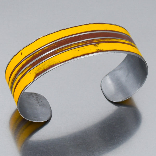Adjustable cuff bracelet made from original 72 Ford pickup paint with yellow and brown stripes, wrist size 5 3/4" to 6 1/2".