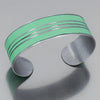 Silver cuff bracelet with mint green enamel and thin silver stripes inspired by classic Chevy Blazer painted steel