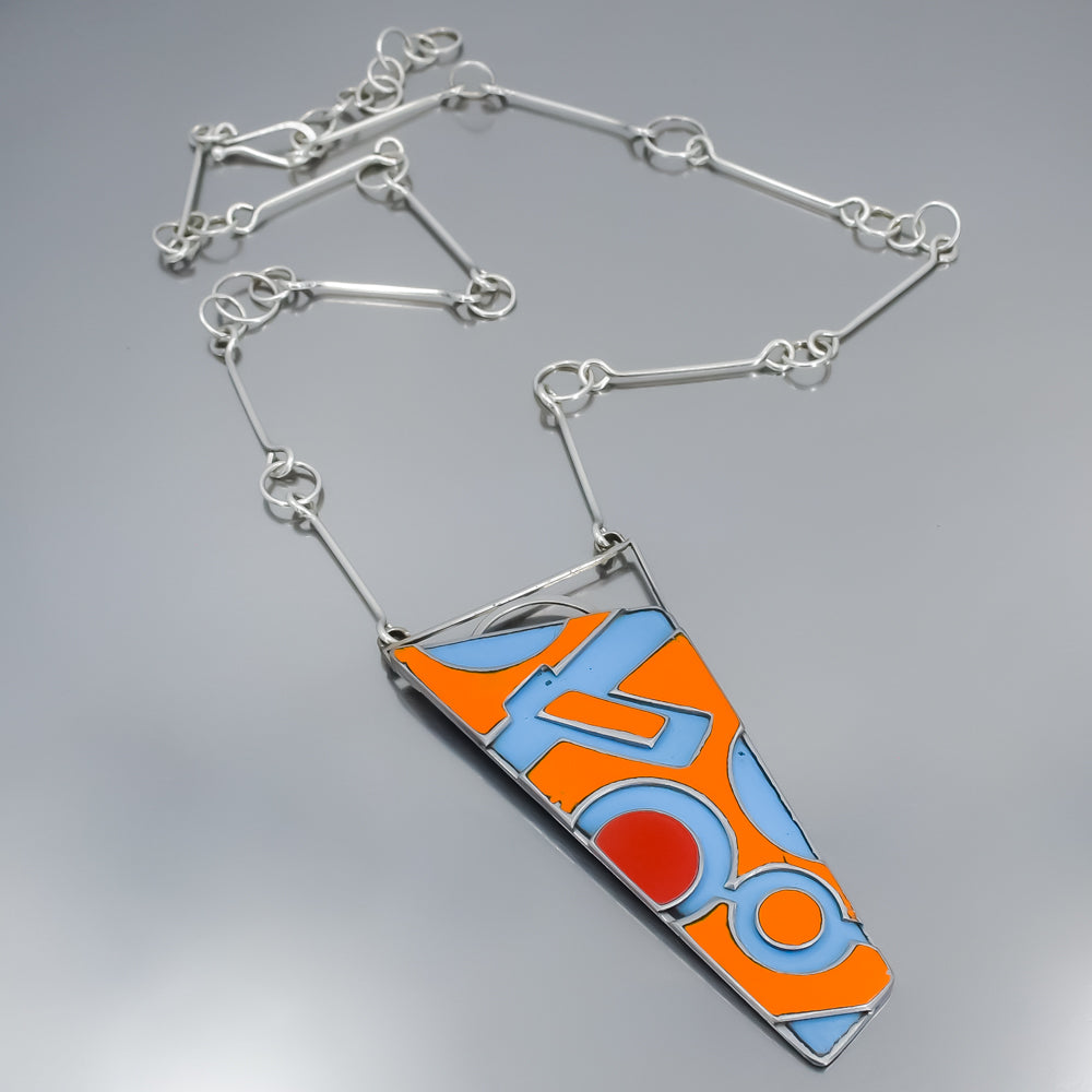 Pendant necklace with orange, blue, and red car paint from vintage International Scout and Ford Falcon on sterling silver chain