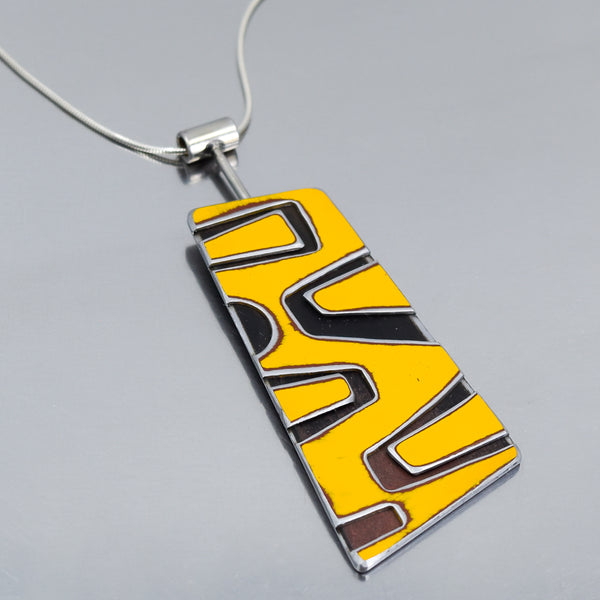 Sterling silver snake chain necklace with a rectangular yellow and black enamel pendant inspired by 1972 Ford pickup details.