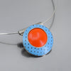 Round pendant necklace with blue and orange original car paint from 77 International Scout and 74 Ford F150 on silver cable