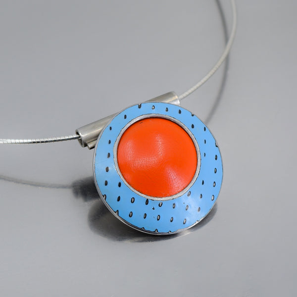 Round pendant necklace with blue and orange original car paint from 77 International Scout and 74 Ford F150 on silver cable