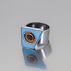 Silver ring with blue and orange enamel featuring original car paint from 77 International Scout and 79 International Scout