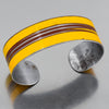 Adjustable cuff bracelet made from 72 Ford pickup original car paint in yellow and brown stripes design