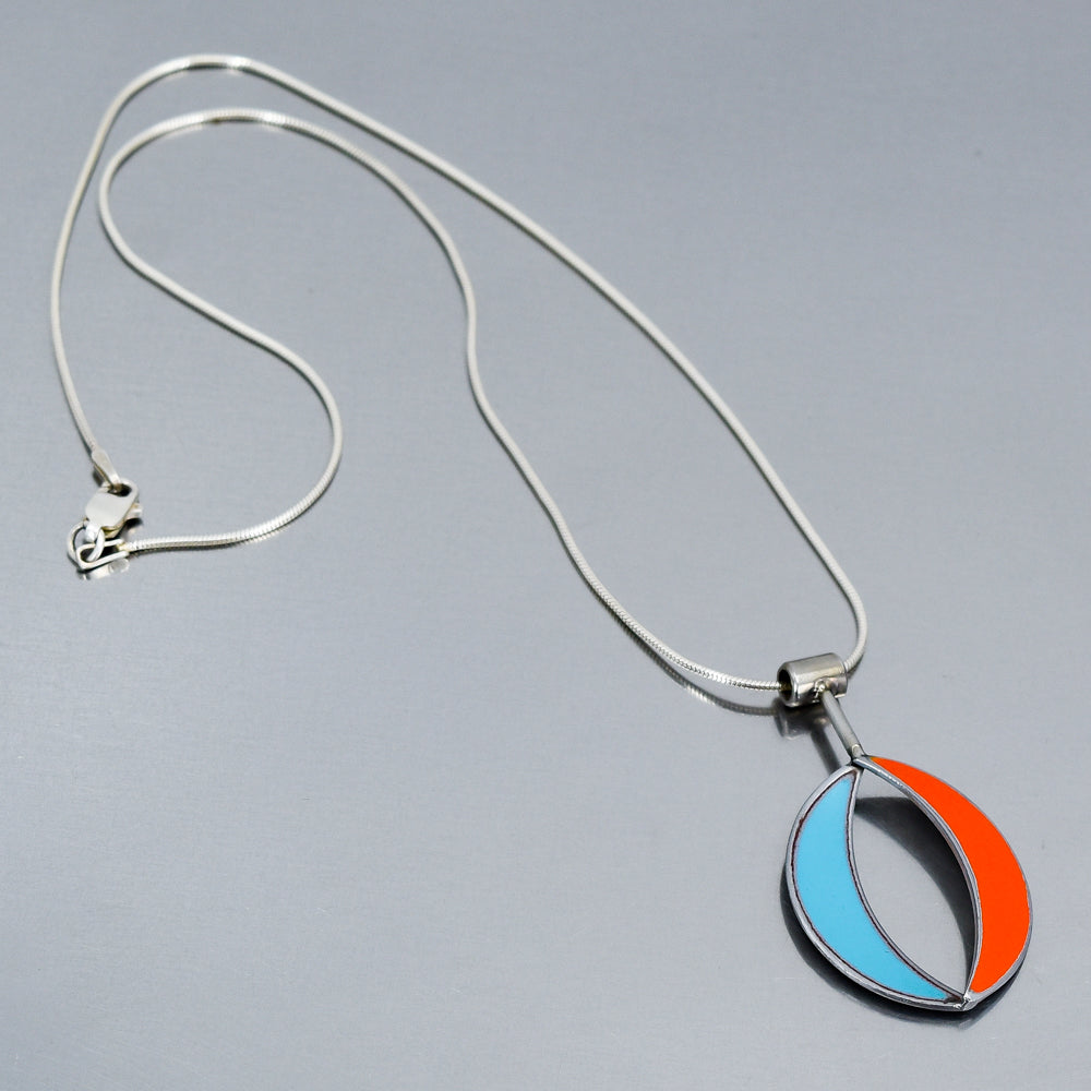 Sterling silver necklace with pendant featuring orange and turquoise original car paint from 74 Ford F150 and 64 Ford Fairlane.