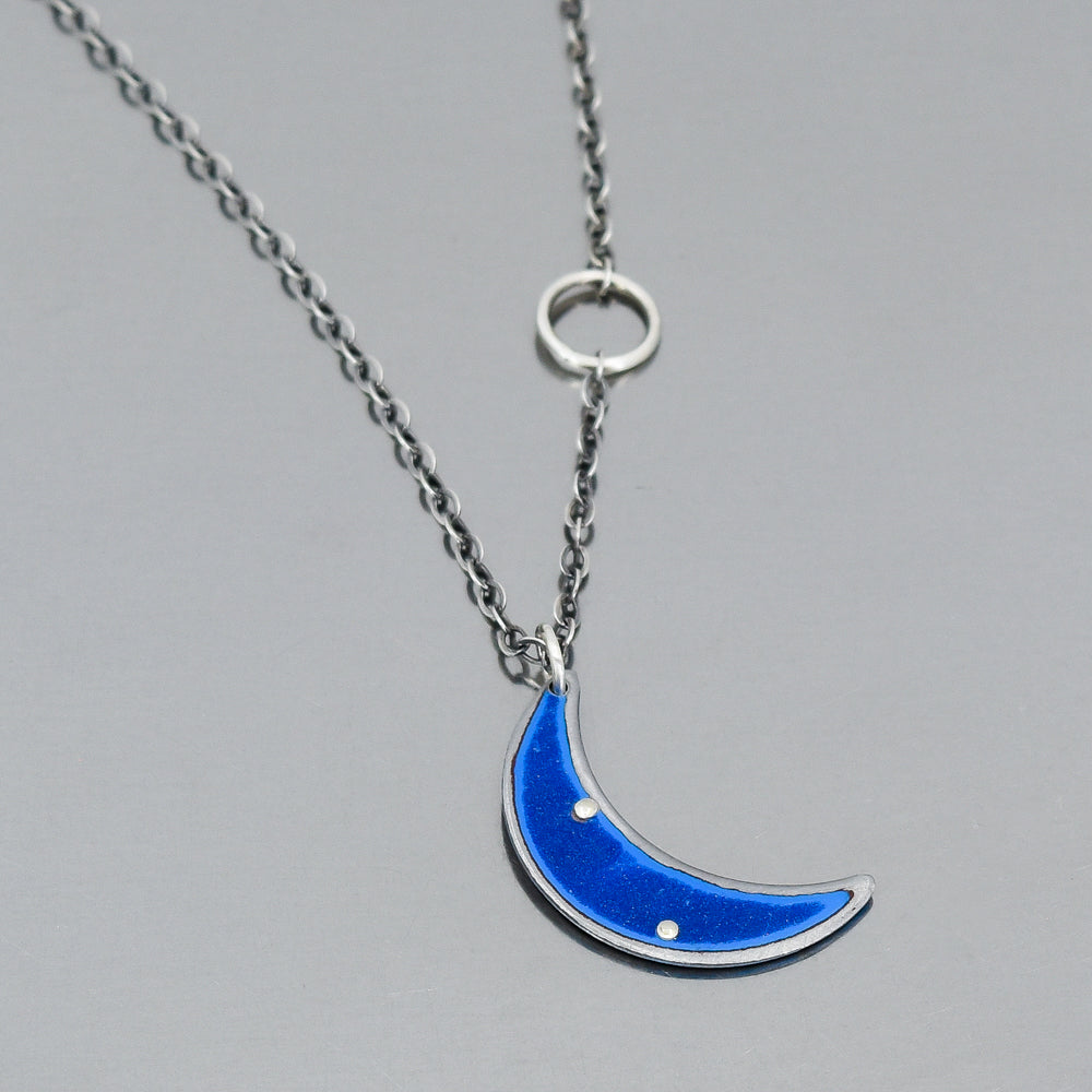 18-inch oxidized sterling silver chain necklace with blue crescent pendant and original car paint finish detail