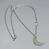18-inch oxidized sterling silver chain necklace with a green crescent pendant made from 69 Chevy Nova car paint.