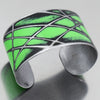 Silver cuff bracelet with bright green and black enamel inspired by a 1978 Ford Bronco painted metal design