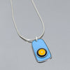Silver snake chain necklace with blue and yellow enamel pendant inspired by vintage 70s Ford pickup paint finish