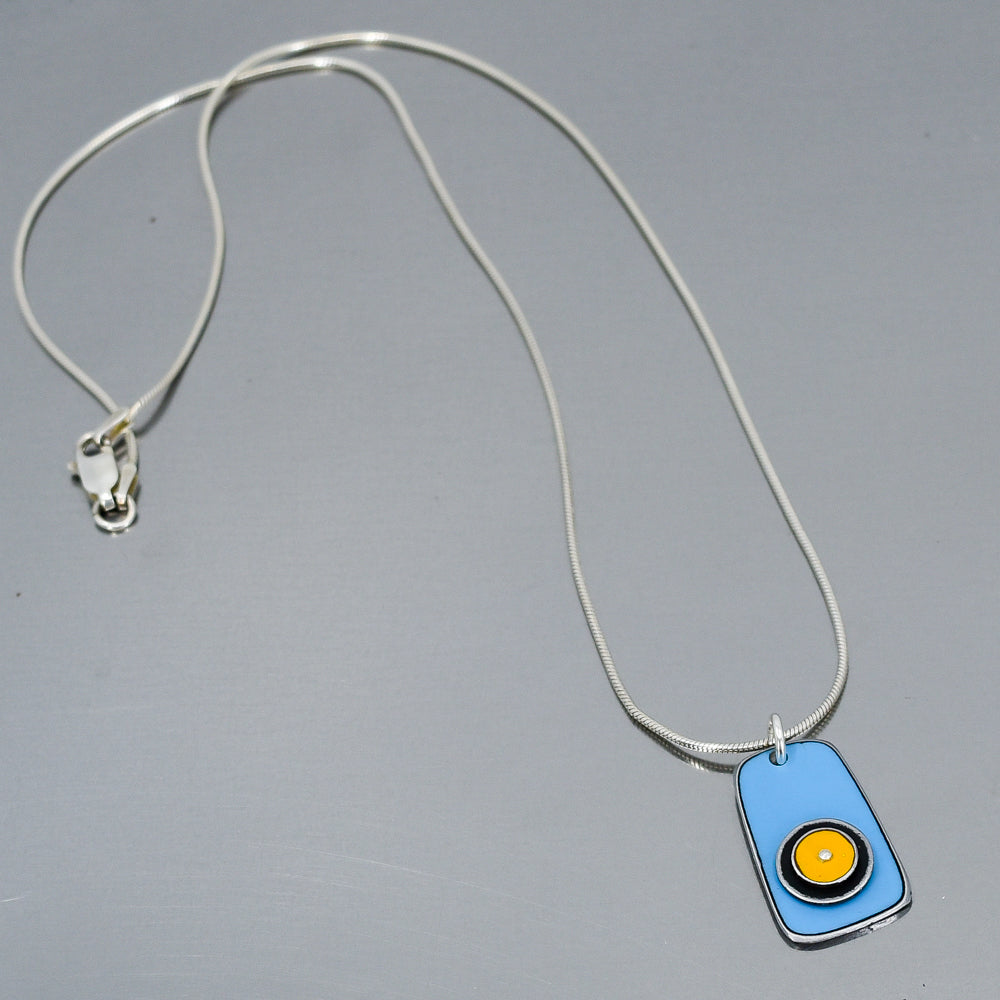 Sterling silver snake chain necklace with a blue pendant featuring original 77 International Scout car paint detail.