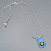 Sterling silver snake chain necklace with a blue pendant featuring original 77 International Scout car paint detail.