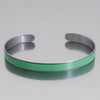 Silver cuff bracelet with a turquoise green enamel strip made from original Chevy Blazer vintage car paint