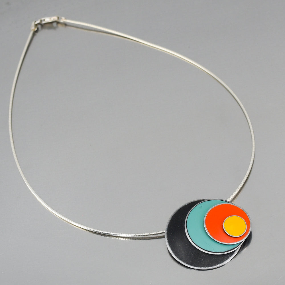 Sterling silver necklace with black, turquoise, orange, and yellow enamel circles from classic Ford and Chevy truck paint colors