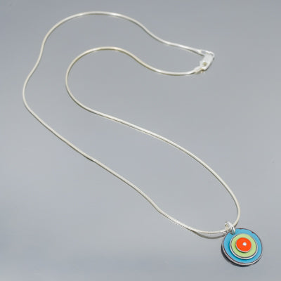 Clara - Ford & Plymouth necklace with original turquoise Ford Thunderbird paint on sterling silver chain. concentric circles in orange and sublime green made from vintage car parts by Joyride Jewelry