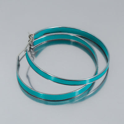Claire - Ford Fairlane earrings with turquoise original car paint and stainless steel ear wires, 1.75 inches in diameter.