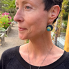 Close-up of a woman wearing Winifred - Pontiac, Plymouth, Ford earrings with original car paint and sterling silver hooks.
