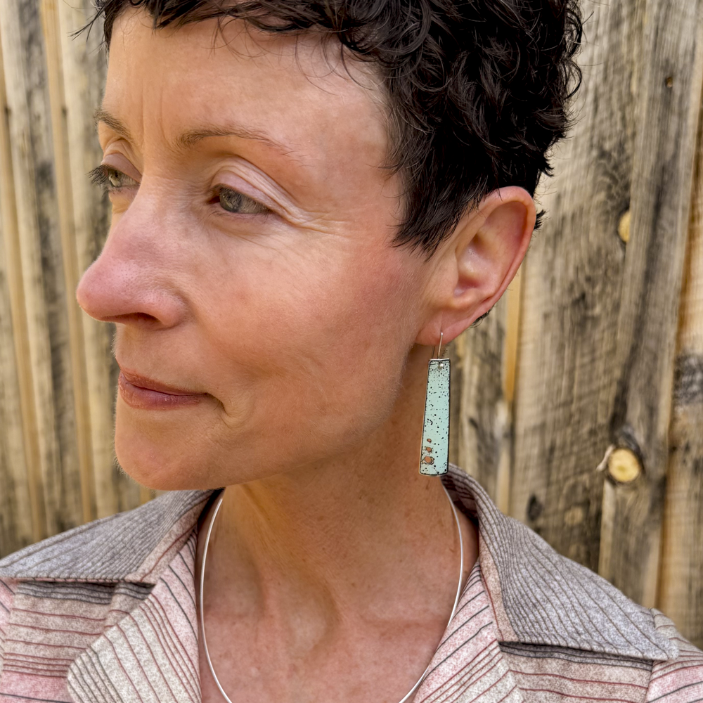 Eugene - AMC Rambler earrings made from original 62 AMC Rambler paint on sterling silver ear wires worn by model.
